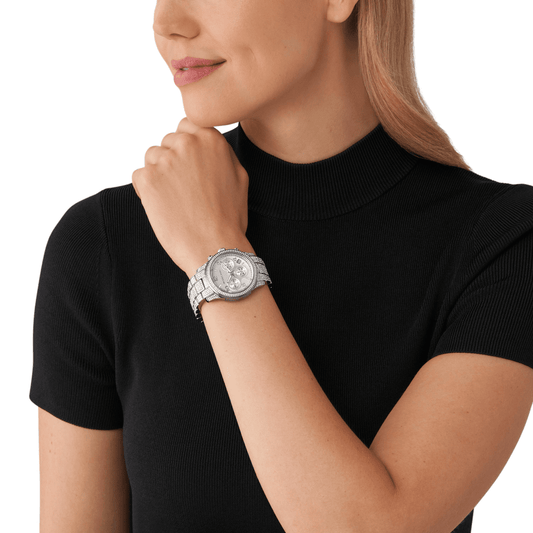 Michael Kors Runway MK7434 silver chronograph watch worn on wrist