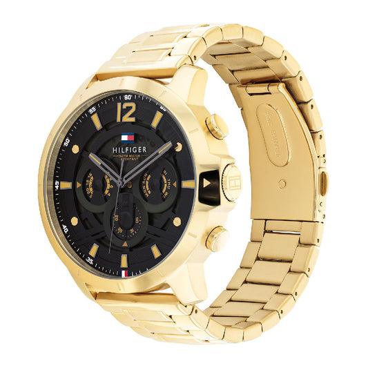 Tommy Hilfiger gold steel chronograph watch with black dial displayed at angle