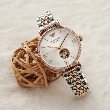 Emporio Armani Gianni women's watch styled on-wrist with two-tone bracelet