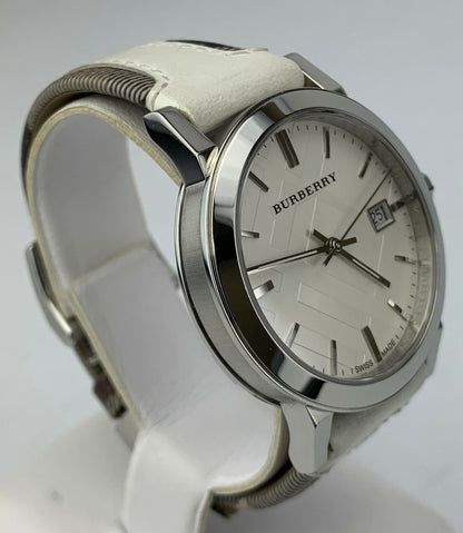 Burberry BU9019 watch angled view showing stainless steel case and white trench check leather strap