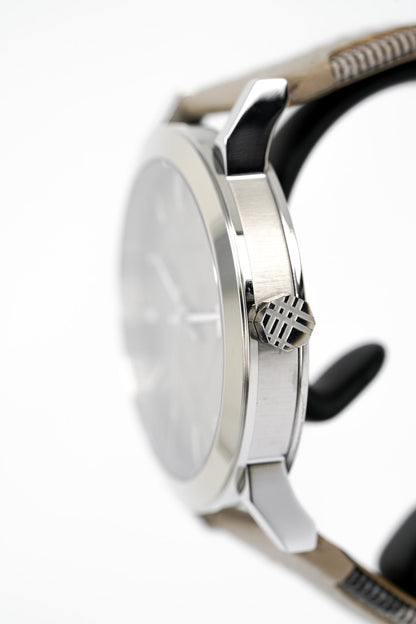 Burberry BU9021 watch side profile showing silver case profile and beige leather strap