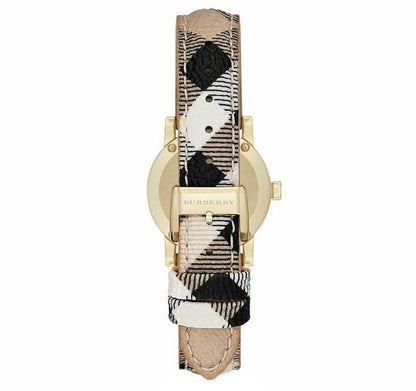 Back view of Burberry The City watch showing gold-tone case back with engraved logo