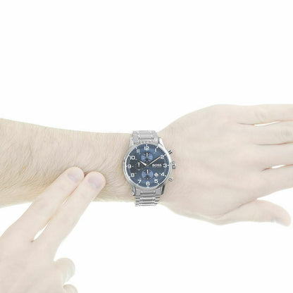 Hugo Boss Aeroliner chronograph blue dial watch worn on wrist showing stainless steel bracelet