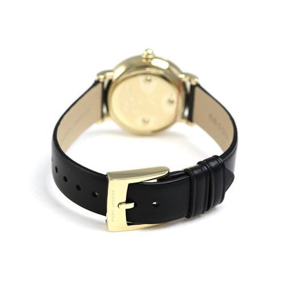 Back view of Marc Jacobs Classic Mini watch with gold-tone caseback and black leather strap with buckle