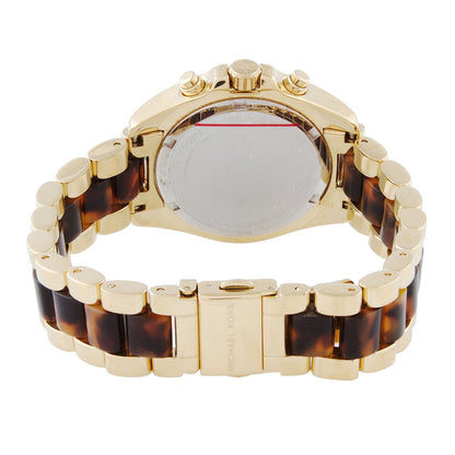 Michael Kors Mini Bradshaw watch caseback showing tortoise and gold two-tone bracelet detail